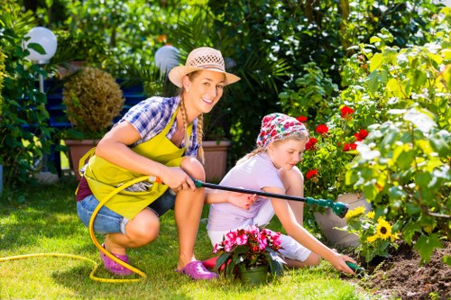 Regular garden care in Wennington showing pruning, weeding, and lawn upkeep